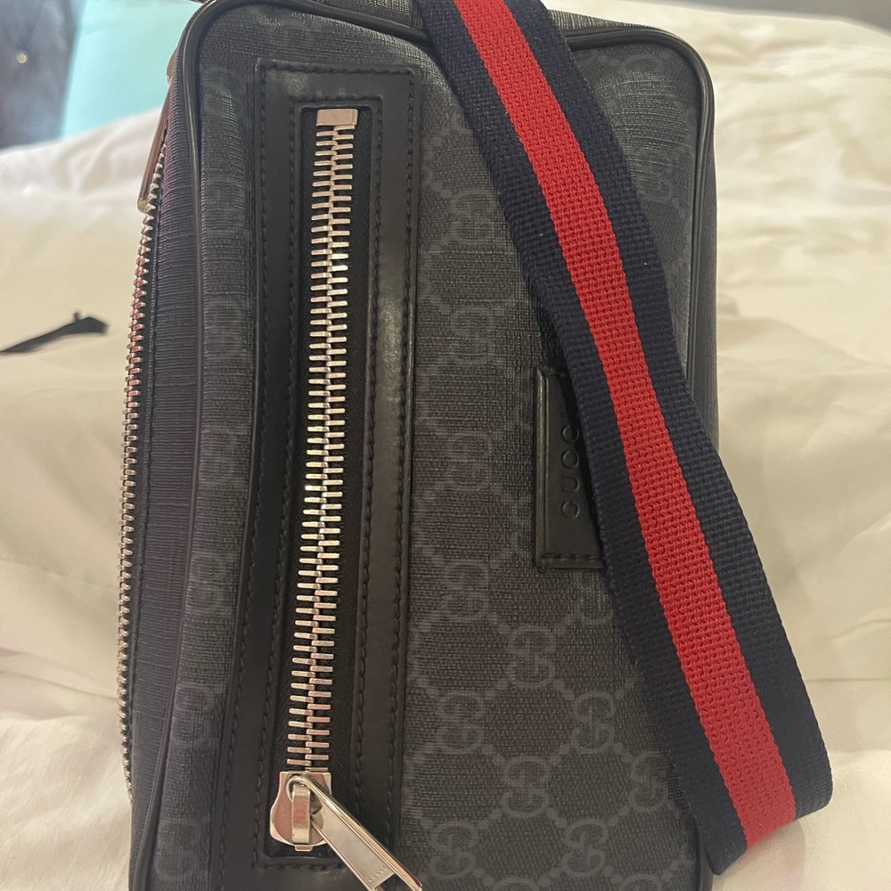 Gucci Black and Red Toiletry Bag with Striking Striped Design